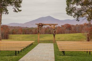 Simple yet effective ceremony site for Will and Emily with Flowers by Bloom's by Doyles