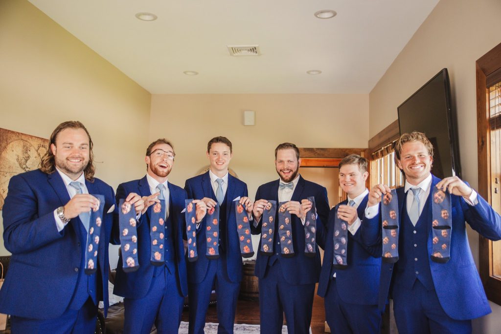 Marcus' face on the groomsmen socks, Taryn's on his!