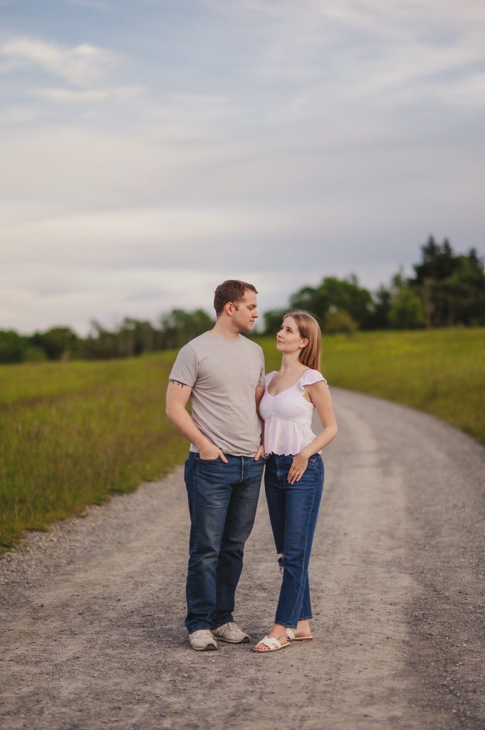 Man and woman standing in a path